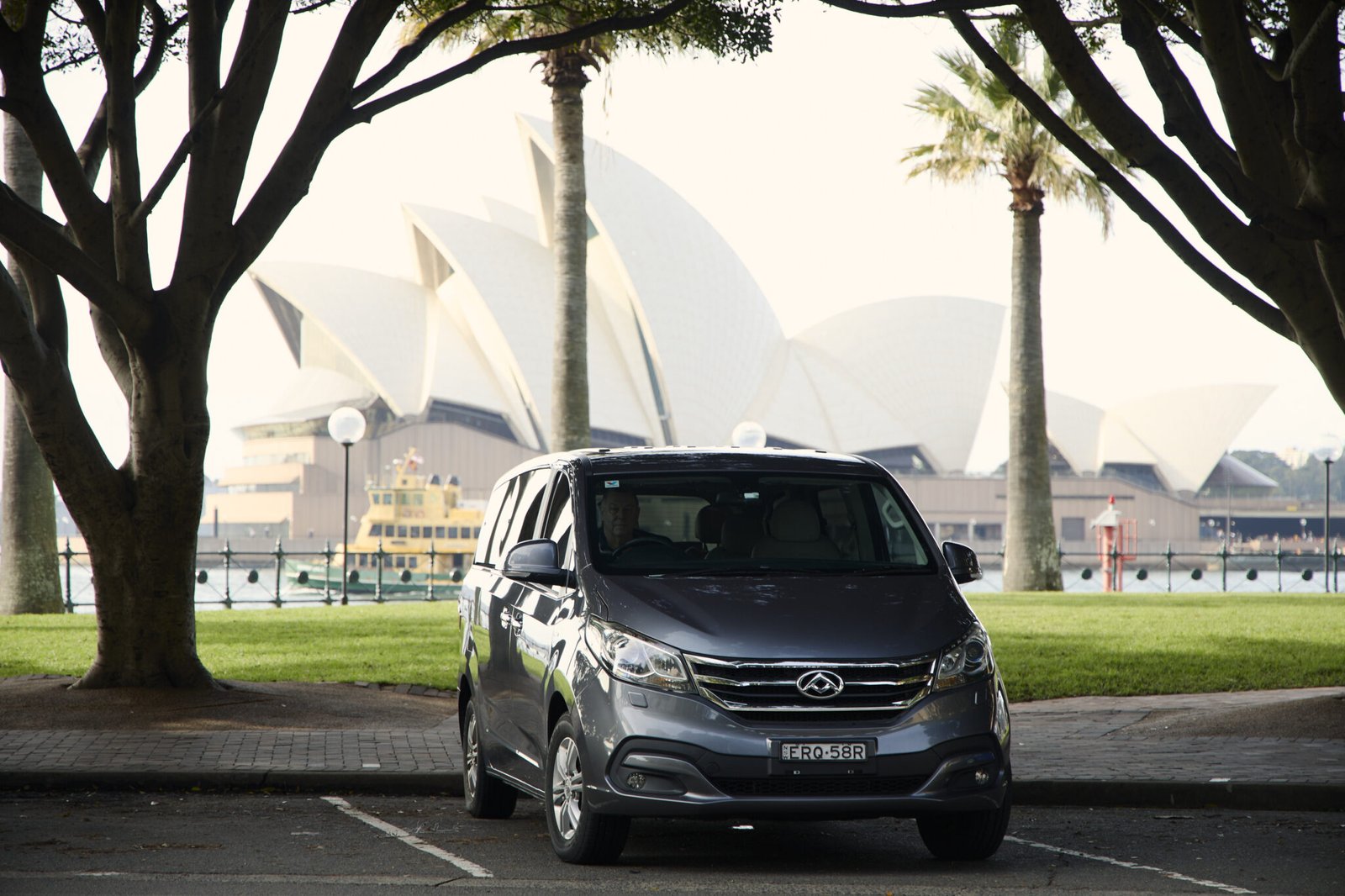 Luxury private van parked near Sydney Opera House