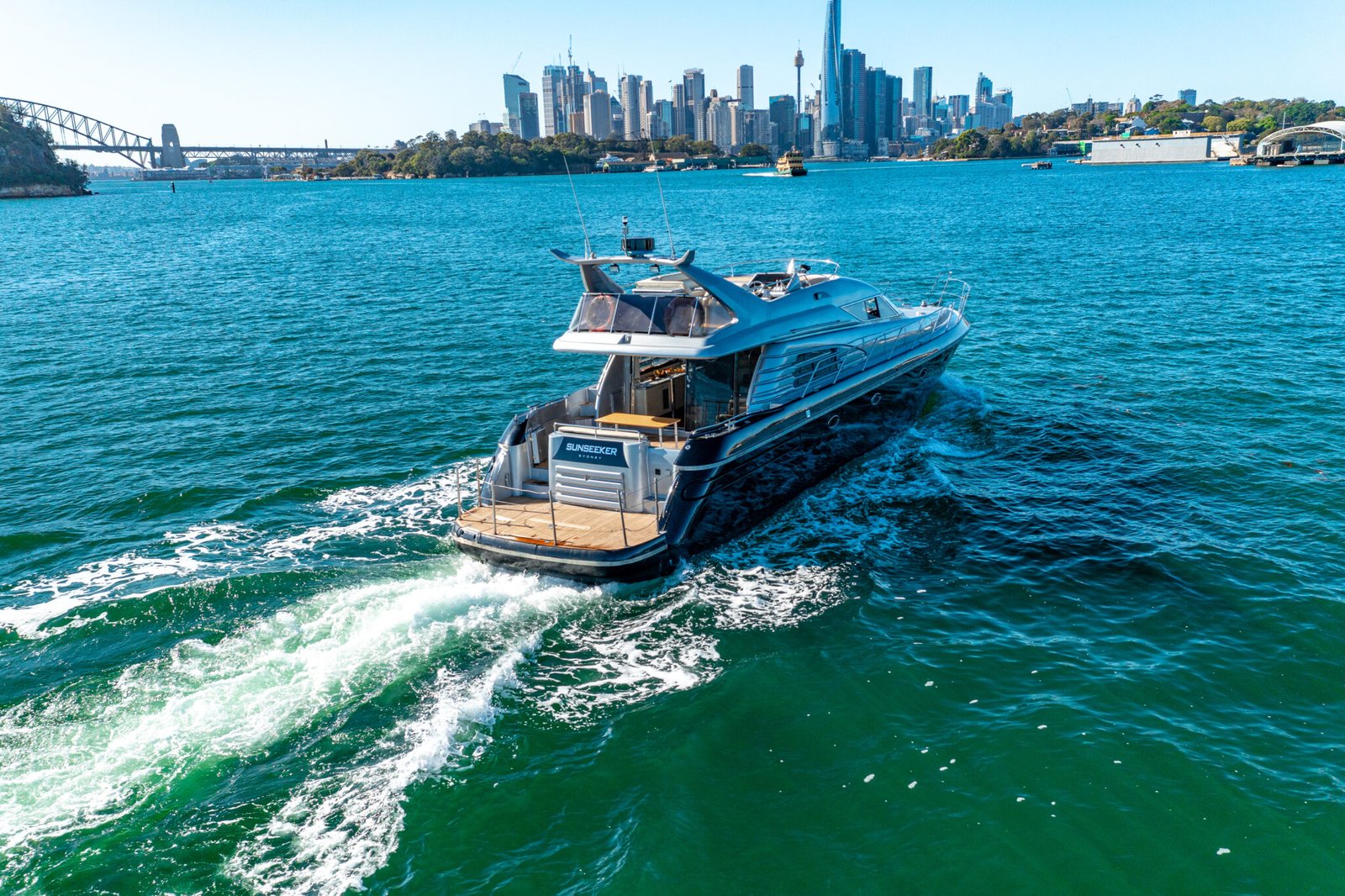 MV Sunseeker side-by-side through Sydney Harbour.