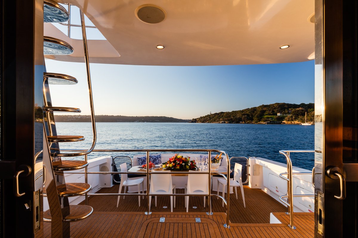 MV state of the art with guests preparing to board at sunset.