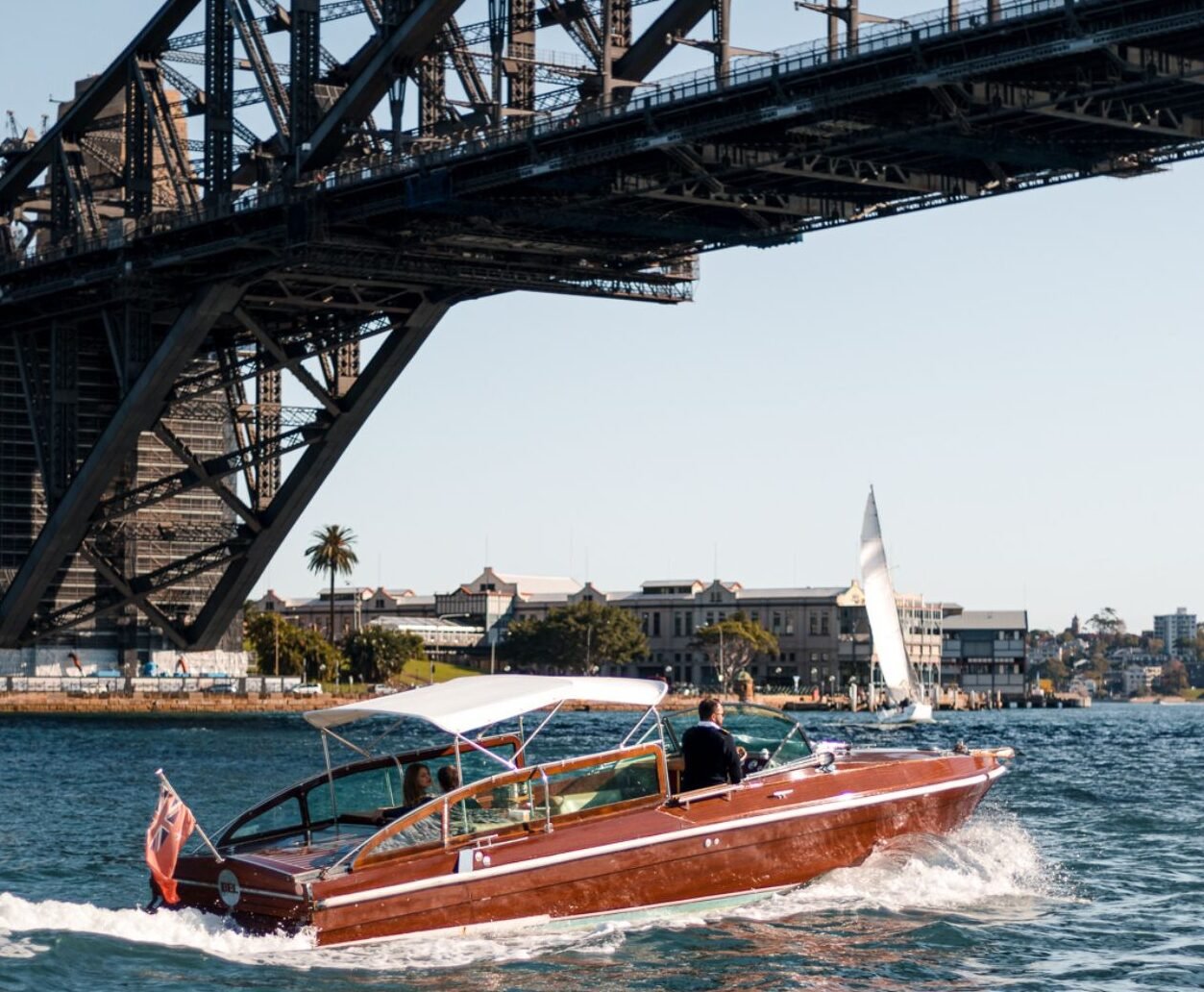 MV Bel Cruising underneath the harbour bridge