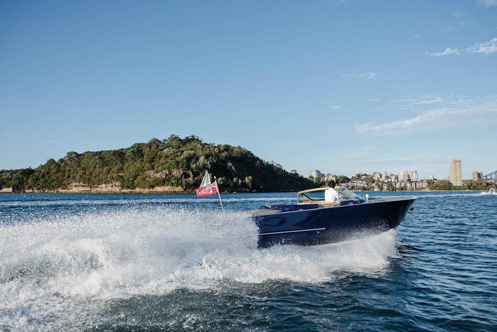 Guests enjoying a private charter on Aquamajestic, with luxurious seating and open views.