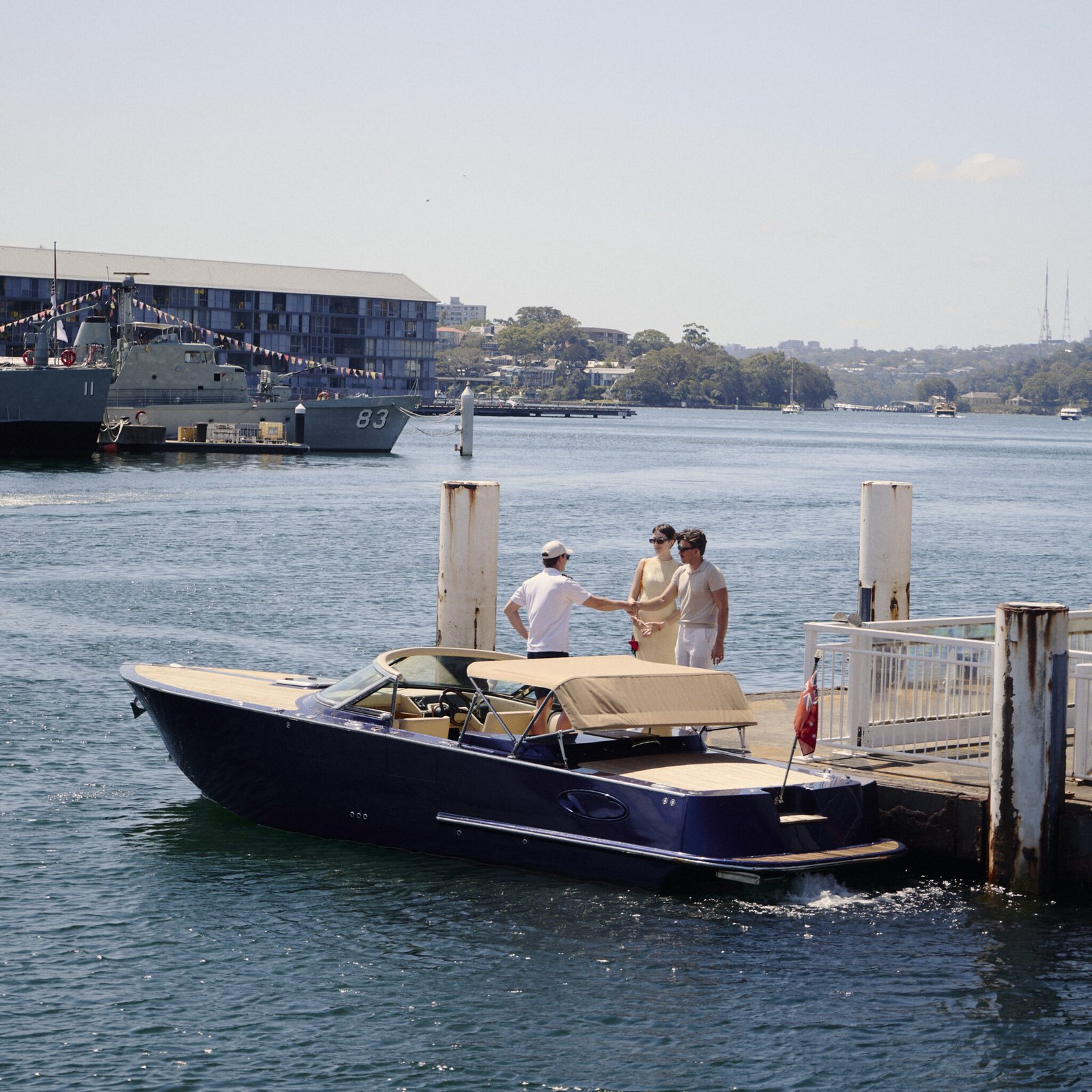 Couple boarding MV Aquamajestic at a Sydney Harbour wharf.