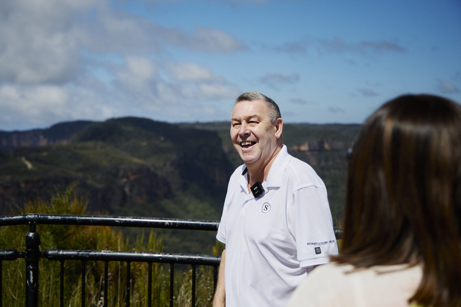 Tour guide overlooking scenic Blue Mountains view