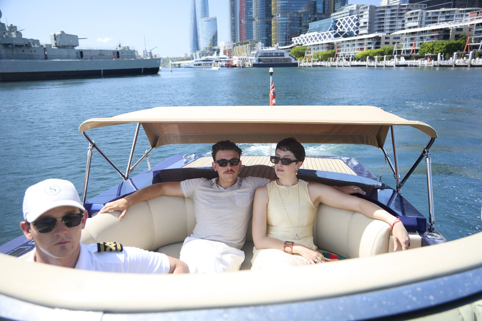Couple seated inside MV Aquamajestic lounge.